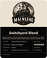 Switchyard Blend coffee beans in a rustic setting